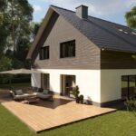 Einfamilienhaus im Grünen mit großer Holzterrasse und Terrassendielen aus Holz von Osmo